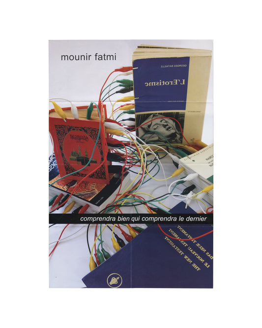 Exhibition poster, Mounir Fatmi, Comprendra bien qui comprendra le dernier, Le Parvis, centre d’art contemporain, Ibos/Pau, 2004. Offset lithograph, 40 × 60 cm unfolded. Recto: colour photograph of books including Quran, Georges Bataille’s L’Érotisme, and New Testament in multiple languages, connected by multicoloured electrical crocodile-clip cables. Text: ‘mounir fatmi’ upper left; ‘comprendra bien qui comprendra le dernier’ in white on black band across centre.