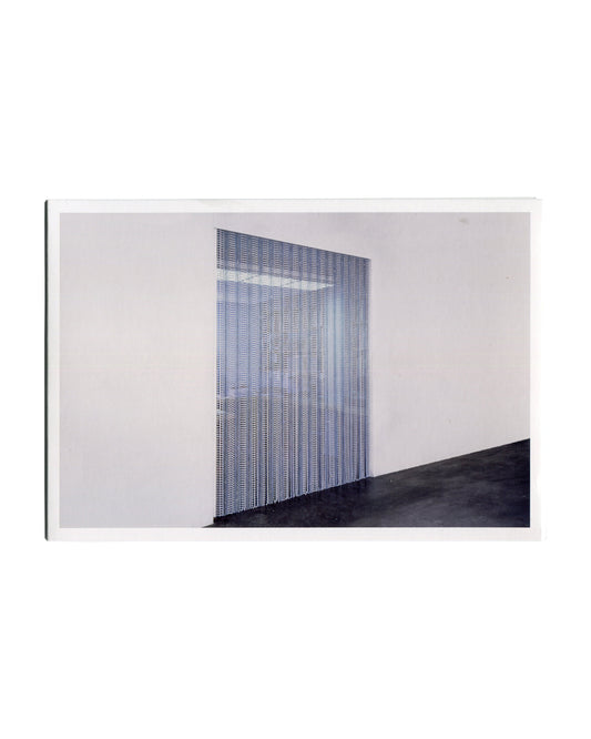  Installation view of Untitled (Chemo), 1991 — strands of beads suspended floor-to-ceiling in a white gallery space, Galerie Jennifer Flay, Paris, 1992.