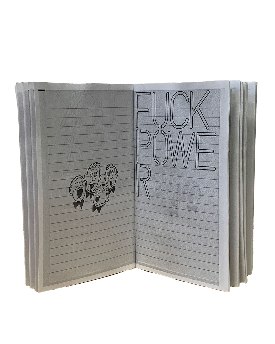 Catherine Holly / The Academy of Realness, Fuck Book, 2014 — interior spread; left page shows rubber-stamped cartoon faces of open-mouthed figures on lined paper; right page shows stencilled text 'FUCK POWER' on lined paper ground