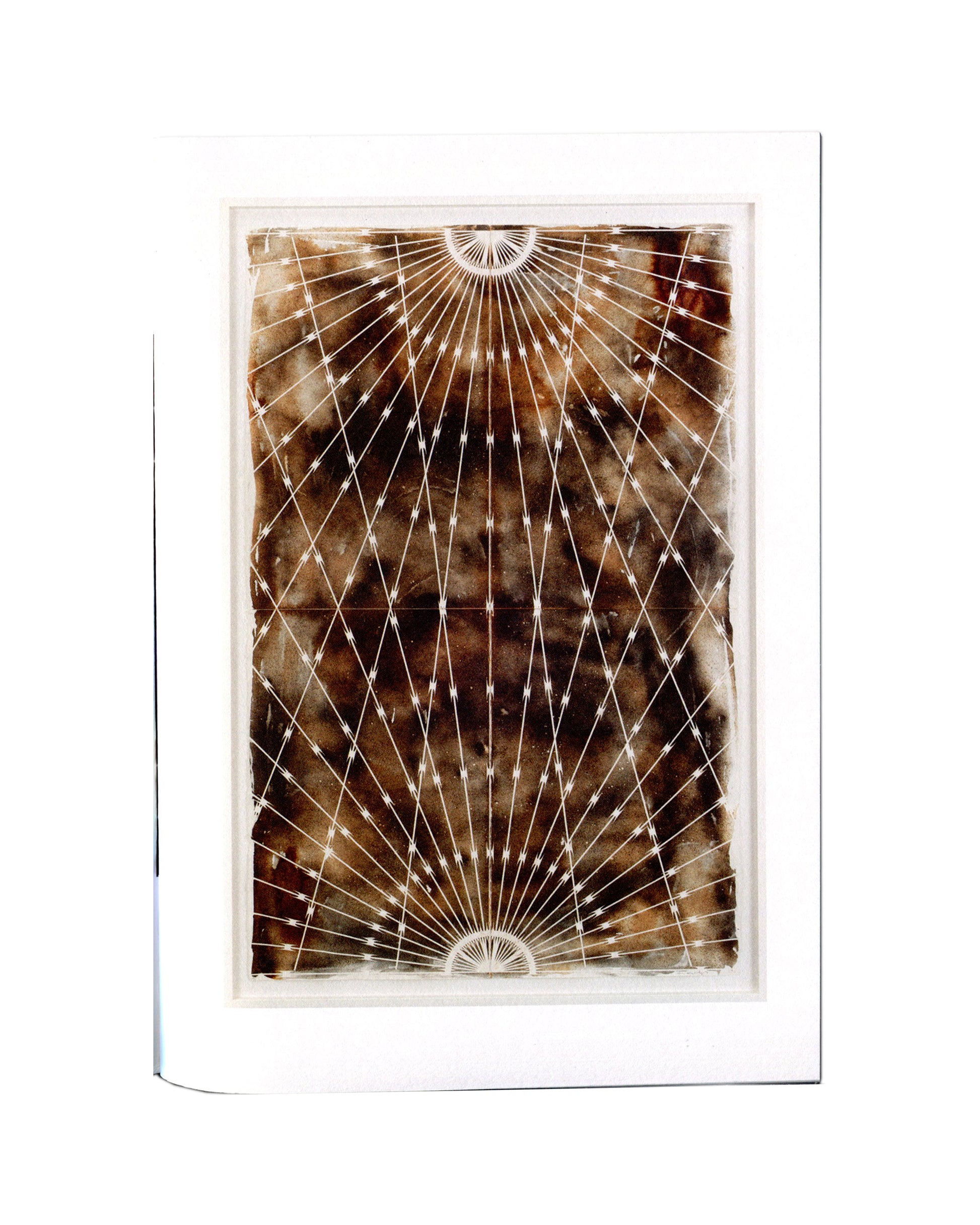 (interior, rust): AlphaBête catalogue plate: Kendell Geers, rust-brown folded surface, radiating white lines from two semicircular forms