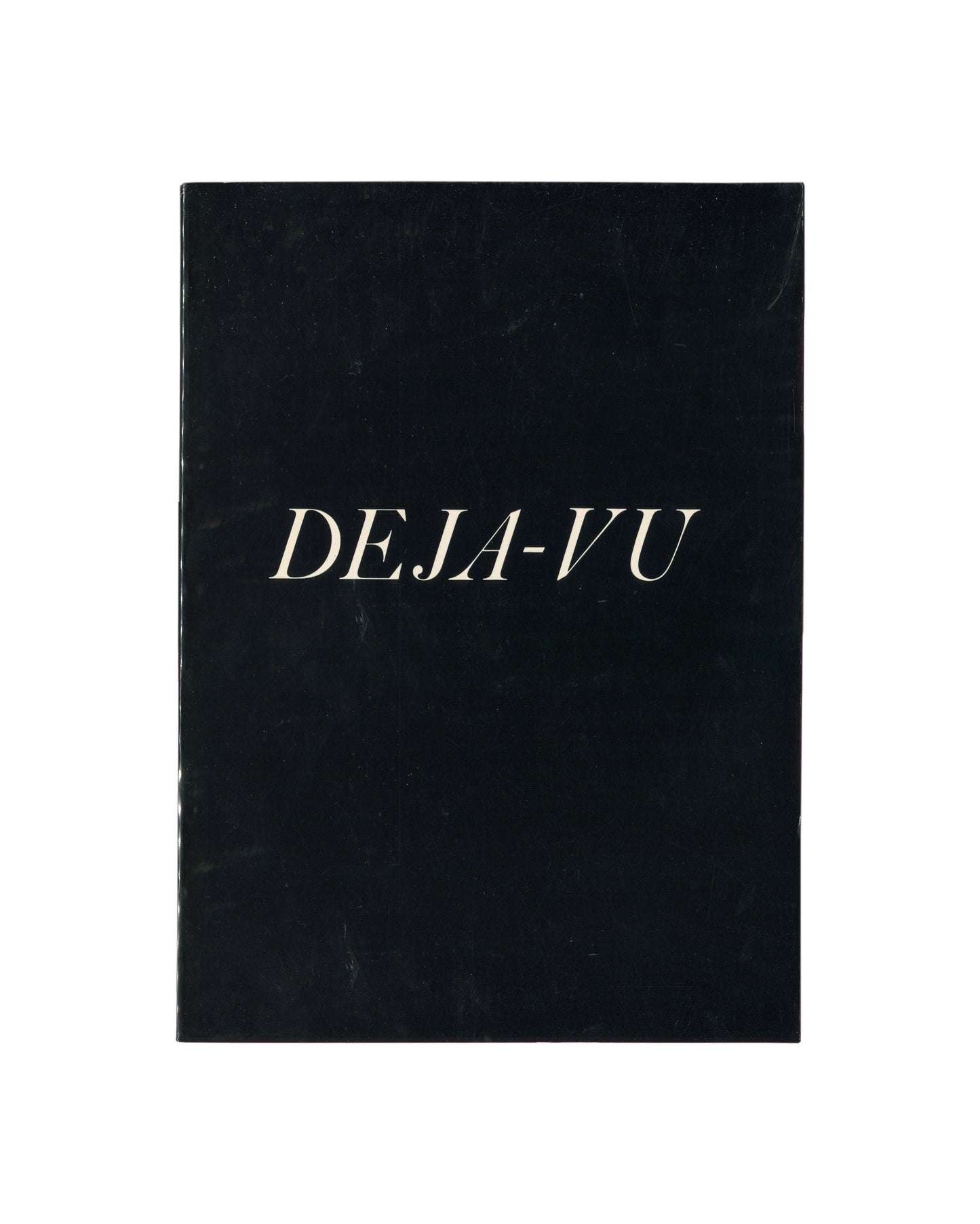 Cover Cover of Ralph Gibson, Deja-Vu, Lustrum Press, New York, 1973, showing the title in white italic serif type centred on a solid black softcover.