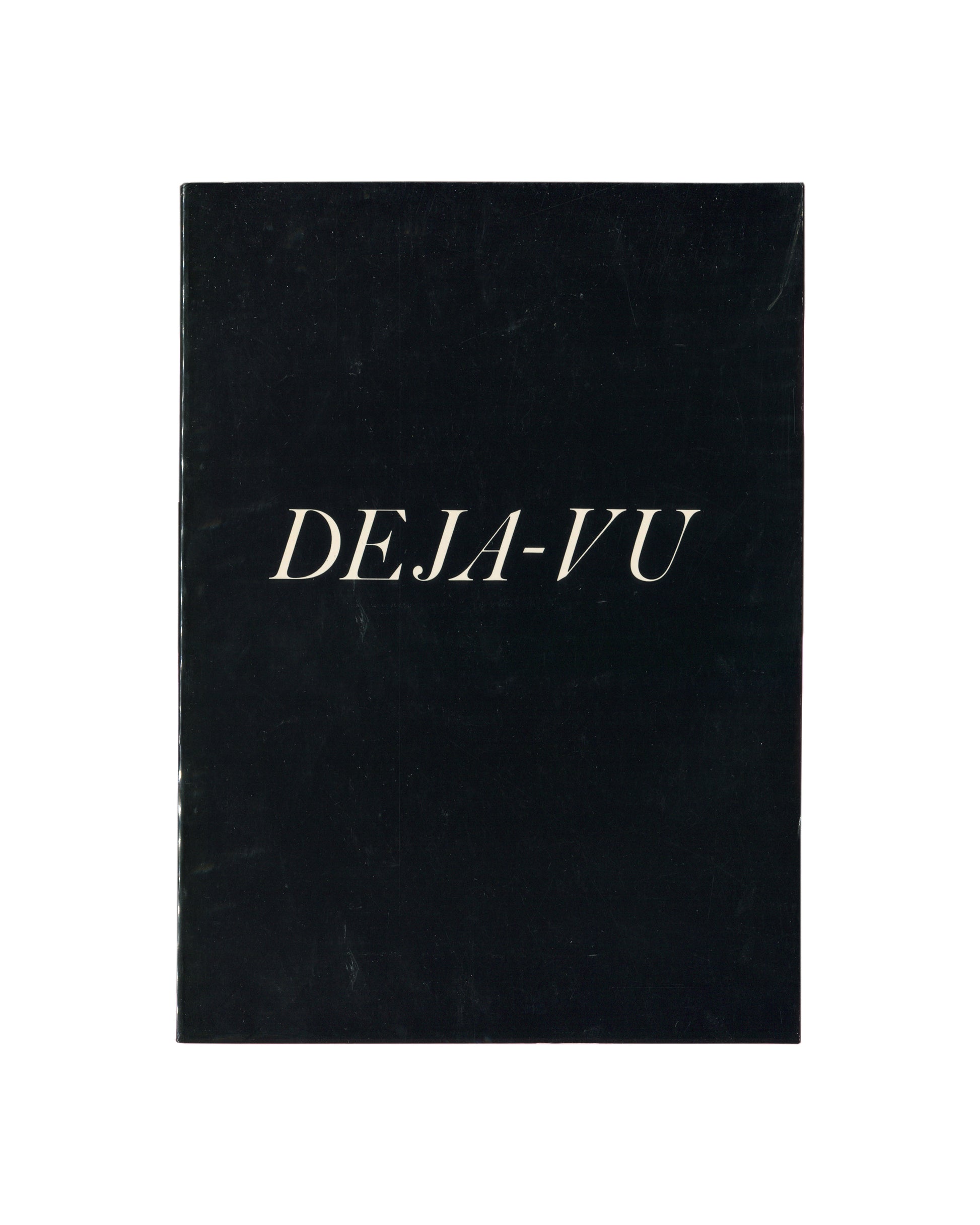 Cover Cover of Ralph Gibson, Deja-Vu, Lustrum Press, New York, 1973, showing the title in white italic serif type centred on a solid black softcover.