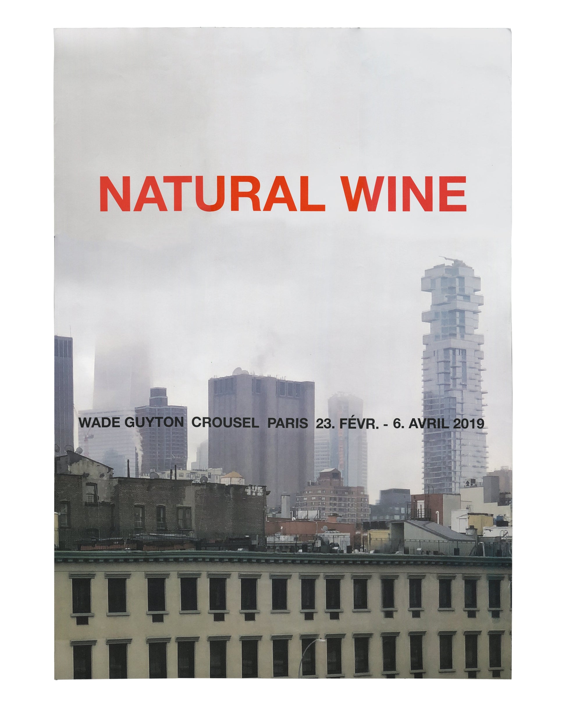 Exhibition poster, Wade Guyton, Natural Wine, Galerie Chantal Crousel, Paris, 2019. Offset print, A1, 59.4 × 84.1 cm. Grey-toned photograph of New York skyline with construction cranes and misty atmosphere; bold red sans-serif title ‘NATURAL WINE’ upper third; black text below: ‘WADE GUYTON CROUSEL PARIS 23. FÉVR. – 6. AVRIL 2019’. Very good condition with light fold lines.