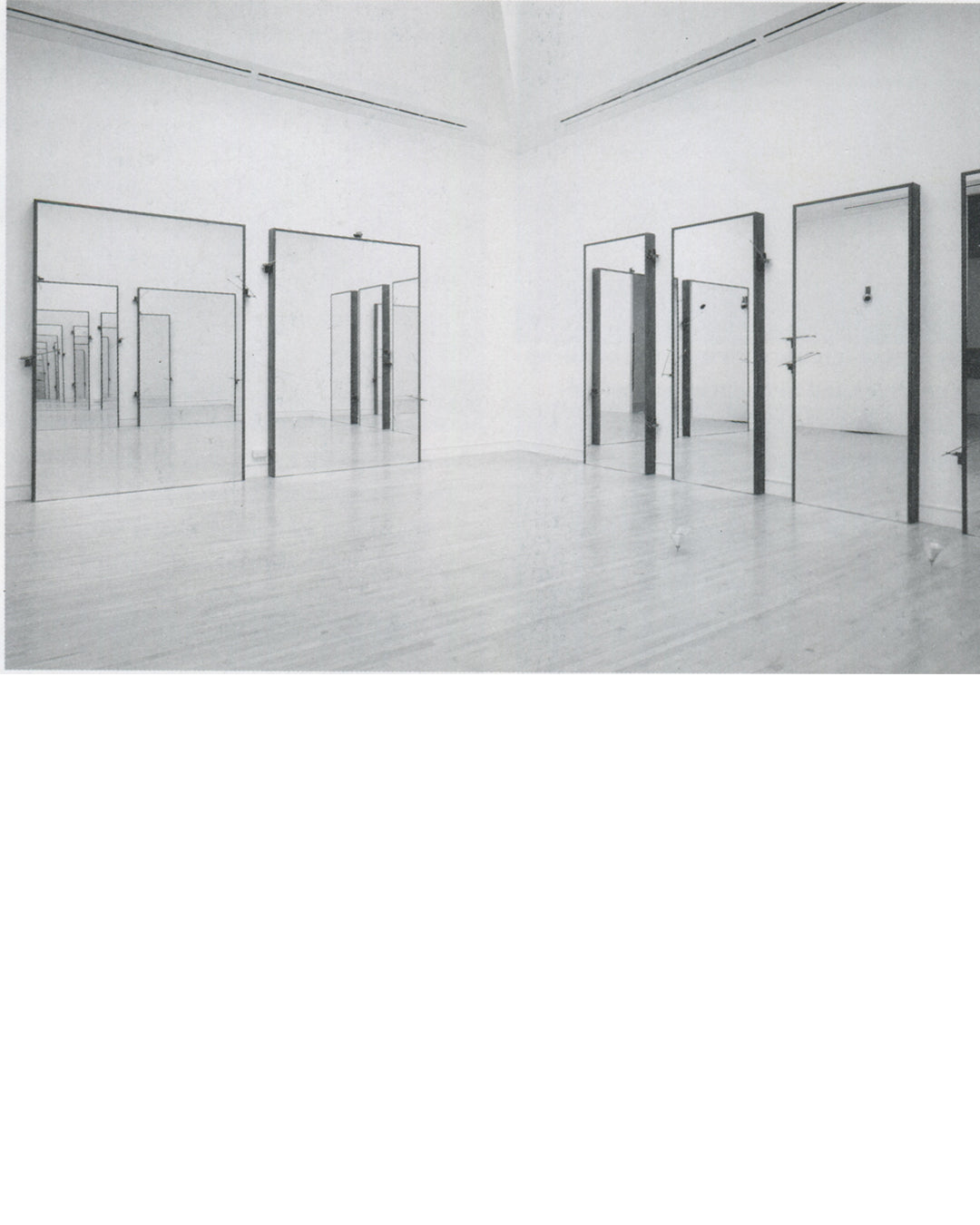 Rebecca Horn, Türen 1994, installation view: multiple framed mirrors facing each other across empty white gallery, receding reflections, Tate 1994