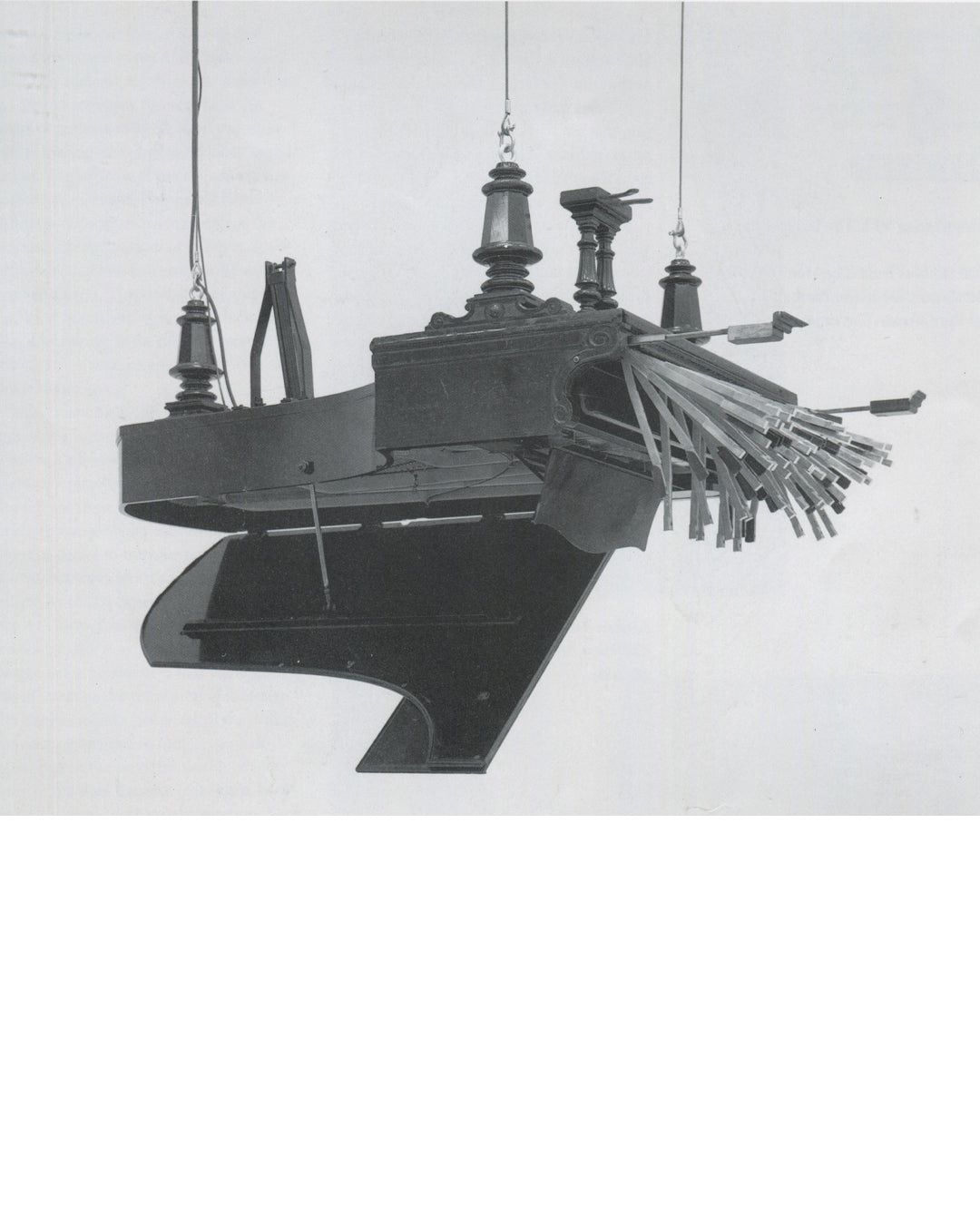 Rebecca Horn, Concert for Anarchy 1990, detail: upside-down grand piano suspended by wires, keys fanned outward, Tate Gallery handout 1994