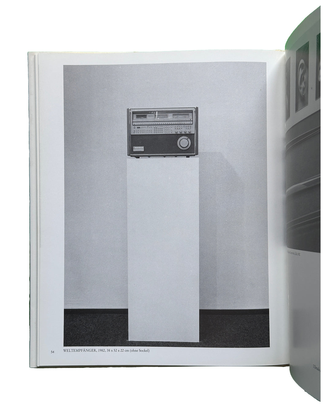 Interior spread: Isa Genzken — Weltempfänger, 1982, 38 x 52 x 22 cm — black and white photograph of Panasonic world receiver radio on tall white plinth
