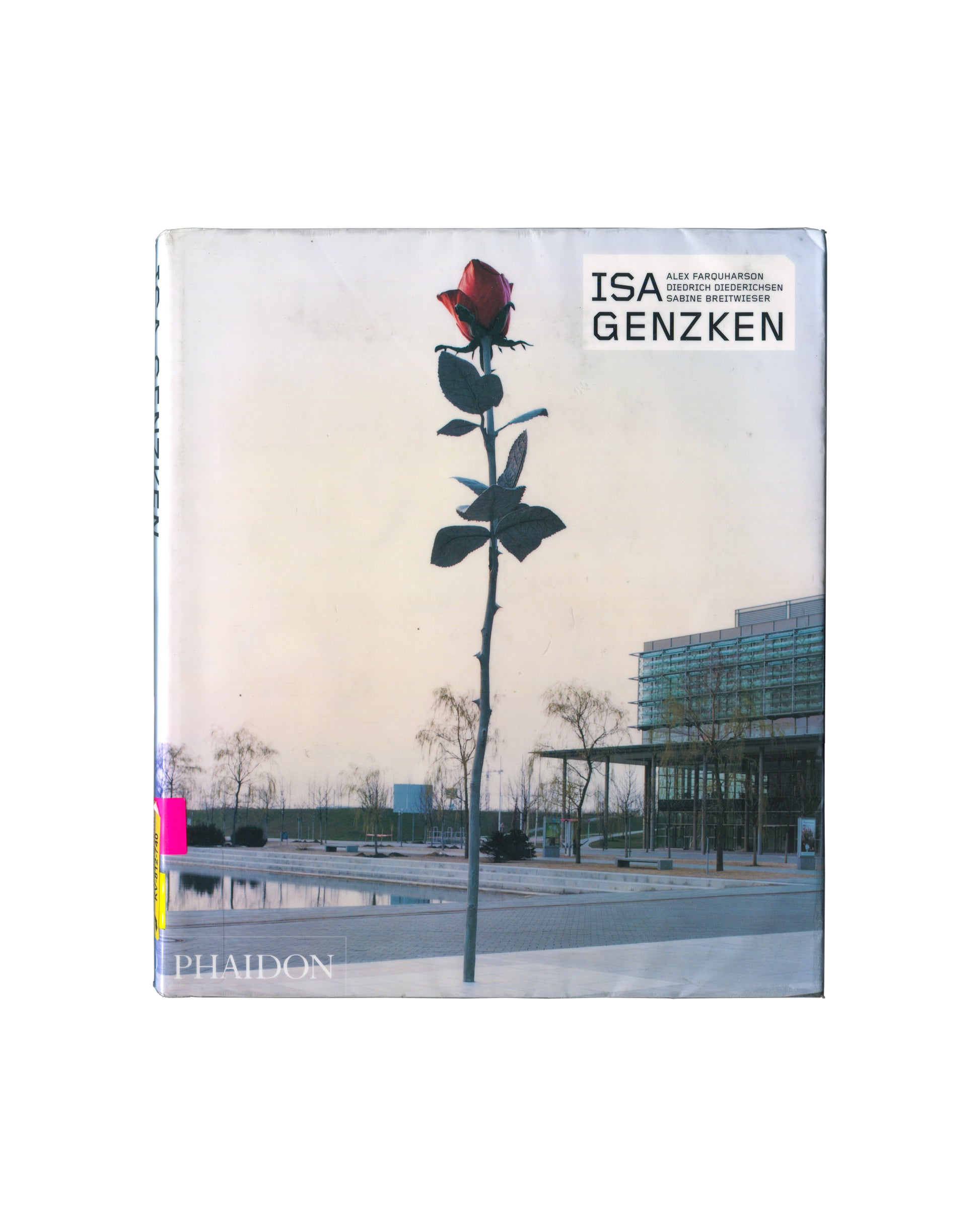 Original 2006 Isa Genzken monograph, Phaidon Contemporary Artists Series. Front cover showing Rose II, a tall slender steel rose sculpture with a single bud, photographed against a pale sky in front of a modernist glass-and-steel institutional building. Title 'ISA GENZKEN' in black sans-serif type upper right, with author names Alex Farquharson, Diedrich Diederichsen, Sabine Breitwieser. Phaidon imprint lower left. Laminated ex-library copy.