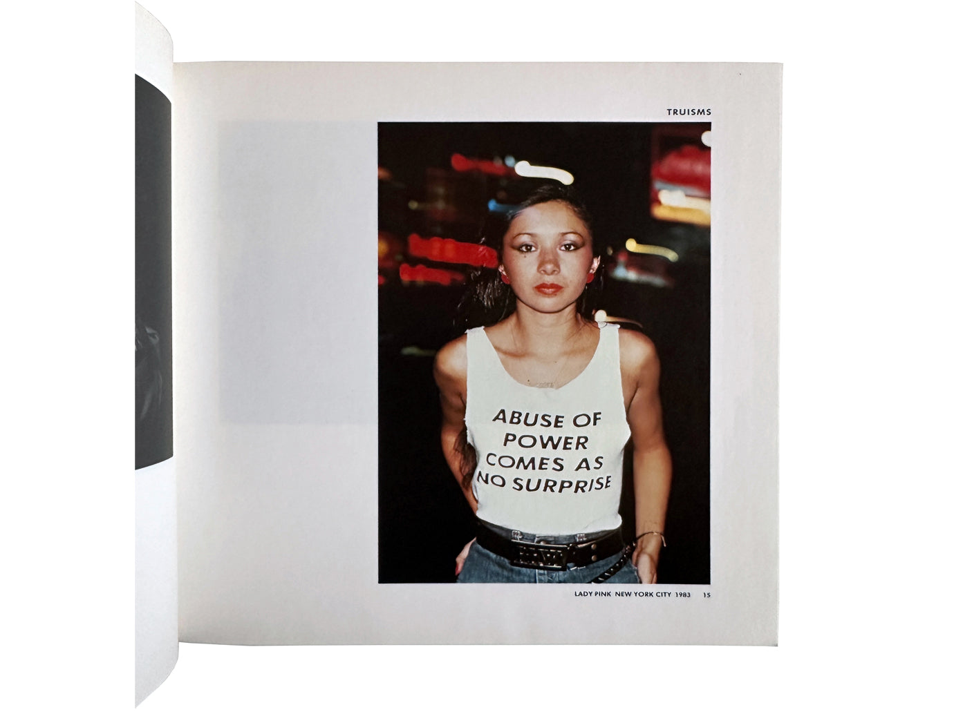 Jenny Holzer — Private Property Created Crime, 1984 — interior spread, Lady Pink wearing Abuse of Power Comes As No Surprise T-shirt, New York City 1983