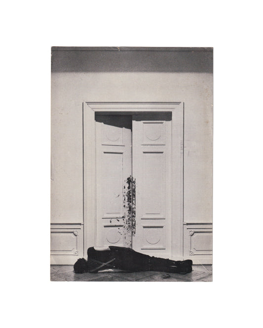 Jochen Gerz, Griechische Stücke, Bündner Kunstmuseum Chur, 1978. Exhibition invitation recto: black-and-white photograph of a figure lying prone on a parquet floor before a set of white double doors, dark mark running down the paintwork above.