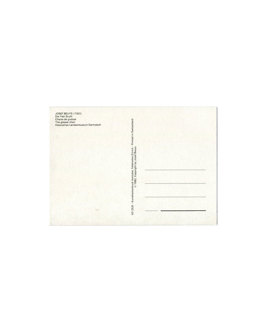 Verso, Joseph Beuys, Der Fett-Stuhl / Chaise de graisse / The Grease-Chair, Hessisches Landesmuseum Darmstadt. Vontobel Kunstkartendruck, Feldmeilen/Zürich, 1982. Divided postcard back. Left: printed caption — 'JOSEF BEUYS (*1921) / Der Fett-Stuhl / Chaise de graisse / The grease-chair / Hessisches Landesmuseum Darmstadt'; publisher: 'Kunstkartendruck Vontobel, Feldmeilen/Zürich – Printed in Switzerland'; '© 1982, Copyright by Josef Beuys'; 'VD 2531'. Right: address lines and stamp area. Unposted, good vint