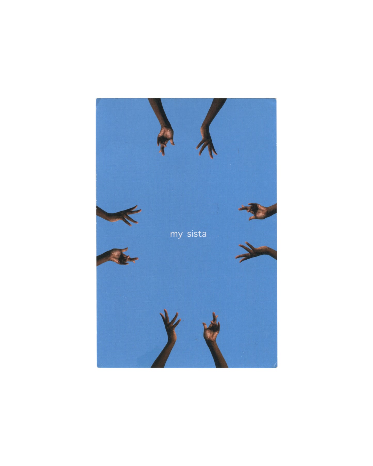 Miatta Kawinzi, Streetspeak, 2016, Studio Museum in Harlem Harlem Postcards Summer 2016. Eight dark-skinned hands reaching inward from the edges of a clear blue sky; small white text at centre reads 'my sista'
