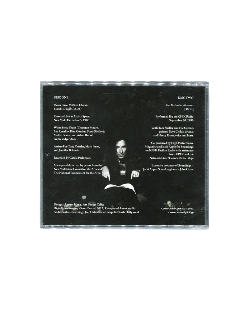 Reverse of sealed Mike Kelley double CD showing track information, recording credits, performance details, and a black-and-white photograph of Kelley. Includes references to Sonic Youth, Artists Space, New York, and KPFK Radio, Los Angeles.