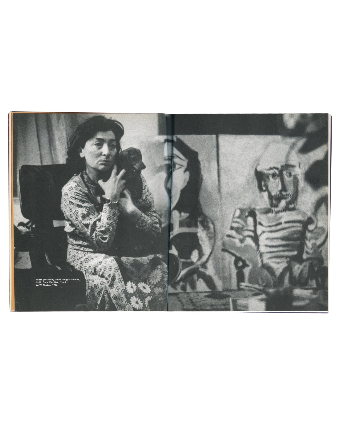  interior spread — left: black-and-white photograph, Jacqueline Roque seated holding a small dog, Picasso canvas visible behind, caption "Photo (detail) by David Douglas Duncan, 1977, from The Silent Studio, W. W. Norton, 1976"; right: same photograph continuing across gutter