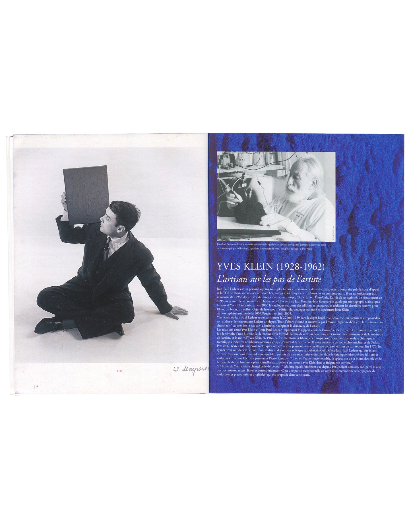 Open spread from 2005 Yves Klein / Jean-Paul Ledeur collection auction catalogue, Pierre Bergé & Associés. Left page: full-page black-and-white photograph of Yves Klein seated on the floor in a dark suit, holding a monochrome painting above his head and gazing up at it. Page number 4 lower left, with handwritten inscription 'W. Maywald' lower right. Right page: colour photograph of Jean-Paul Ledeur at work in a studio or laboratory, with blue pigment visible in the background, alongside the essay heading 'Y