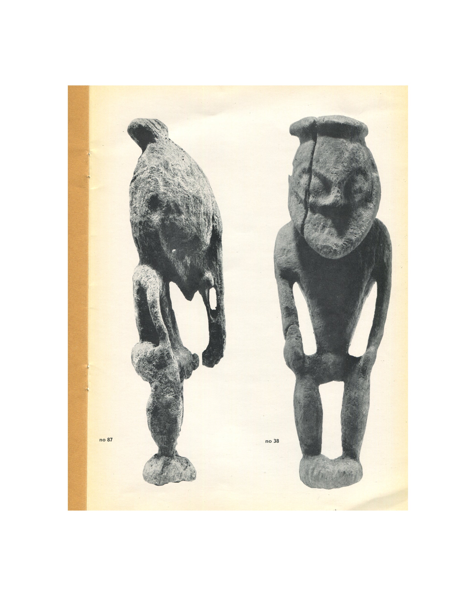 Kunst uit Nieuw Guinea, 1963 — interior plate. Two black and white photographs of carved wooden ancestor figures. Left: cat. no. 87, a bird-headed figure leaning forward, heavily textured surface, viewed in profile. Right: cat. no. 38, a frontal standing figure with large rounded head, open-work torso, arms at sides, and splayed feet. Both dark patinated wood on cream ground.