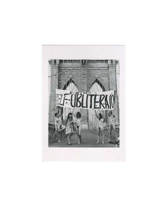 Centre Pompidou postcard reproducing a 1968 black-and-white photograph by Harry Shunk and János Kender of Yayoi Kusama on the Brooklyn Bridge with nude performers covered in polka dots holding a banner reading “KUSAMA SELF-OBLITERATION.”