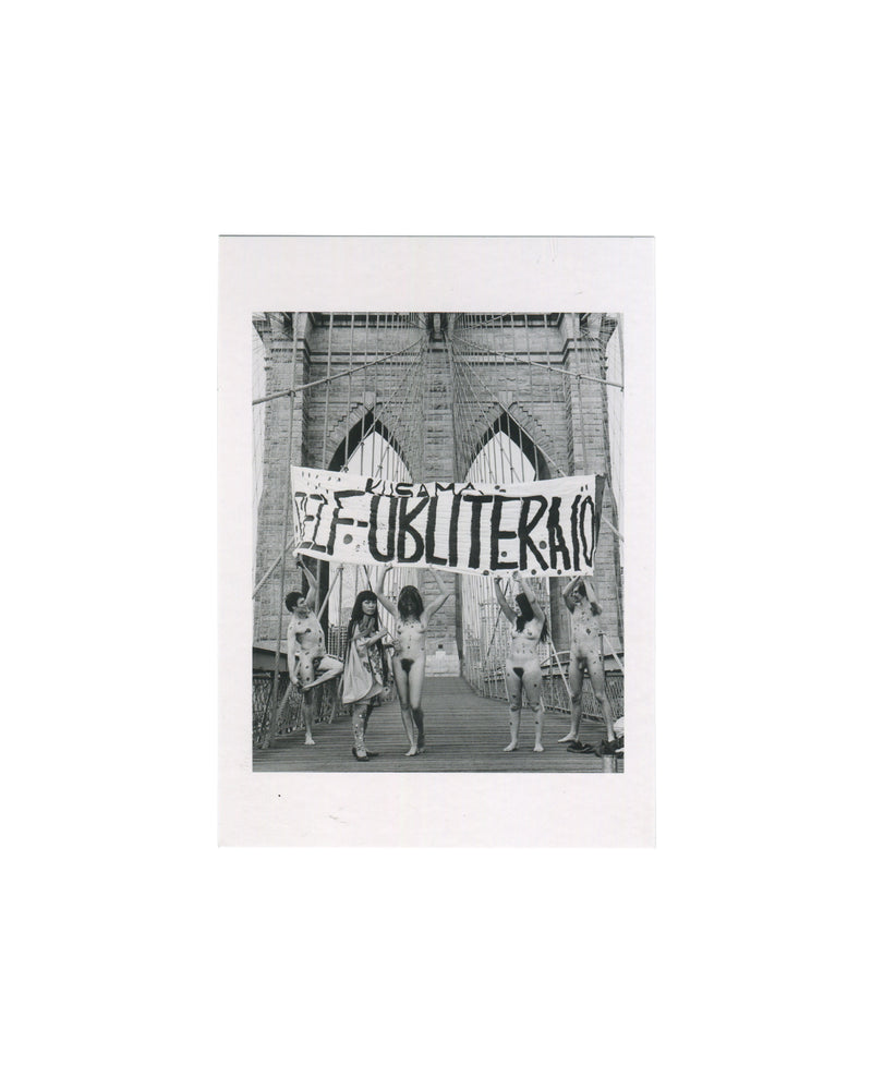 Centre Pompidou postcard reproducing a 1968 black-and-white photograph by Harry Shunk and János Kender of Yayoi Kusama on the Brooklyn Bridge with nude performers covered in polka dots holding a banner reading “KUSAMA SELF-OBLITERATION.”