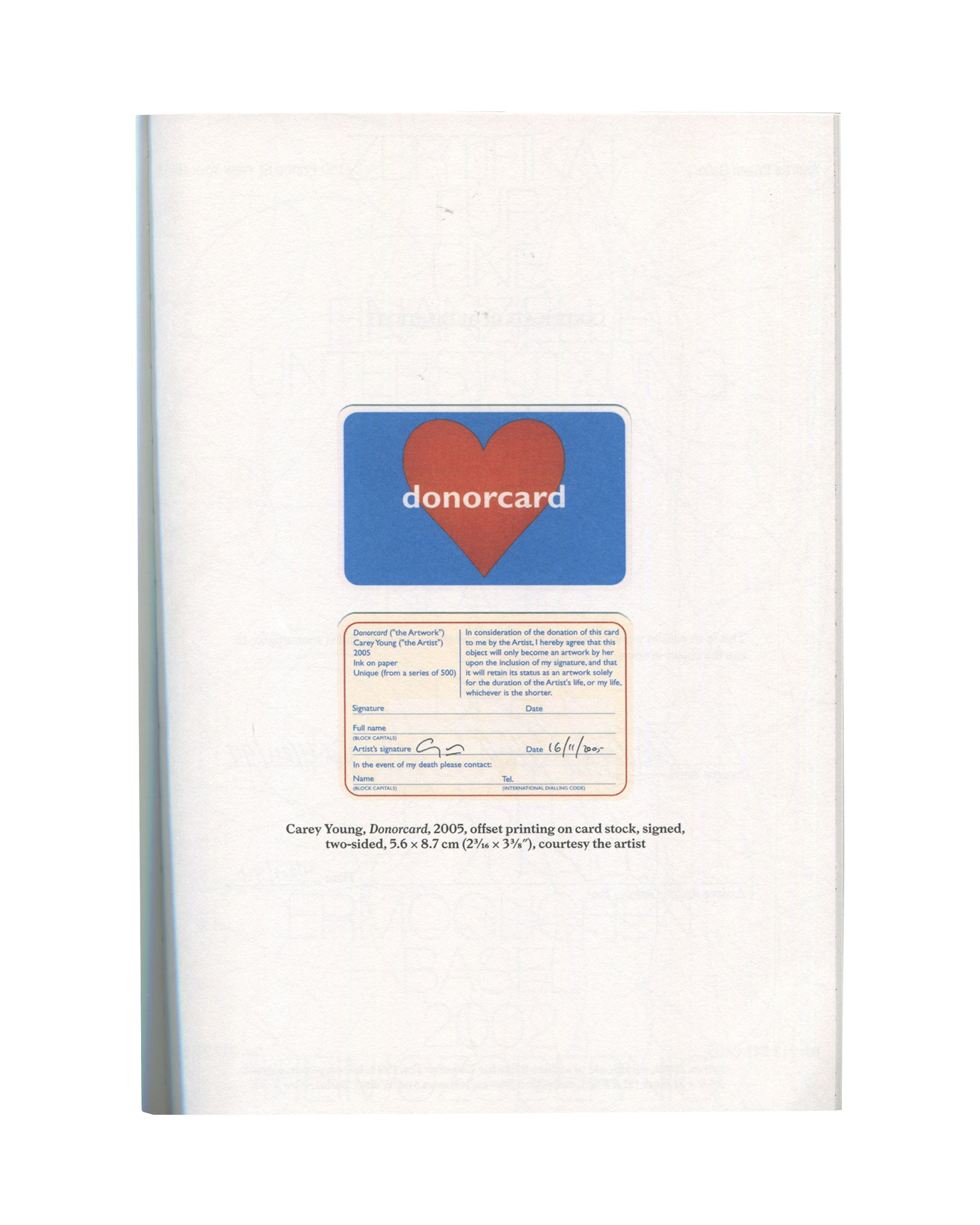 Interior page from In Deed, 2011. Carey Young, Donorcard, 2005, offset on card stock, signed. Blue credit-card with red heart; reverse shows legal certificate text, signed and dated 16/11/2005.