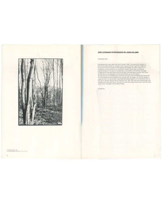 Interior spread of Zoe Leonard, Secession, Wiener Secession, 1997, pages 6–7, left page showing a black-and-white photograph of bare winter trees captioned "Untitled" by Zoe Leonard, 1997, right page showing the introduction to "Zoe Leonard Interviewed by Anna Blume," describing their meeting through ACT UP in New York in the early 1990s.
