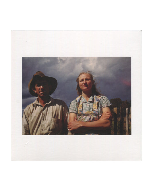 Exhibition invitation for Sherrie Levine’s *Pie Town* featuring a color reproduction from *After Russell Lee: 1–60* (2016). Two figures, Faro and Doris Caudill, stand outdoors beneath a dramatic cloud-filled sky; the man wears a worn hat and work shirt while the woman stands with folded arms in a patterned dress and apron.