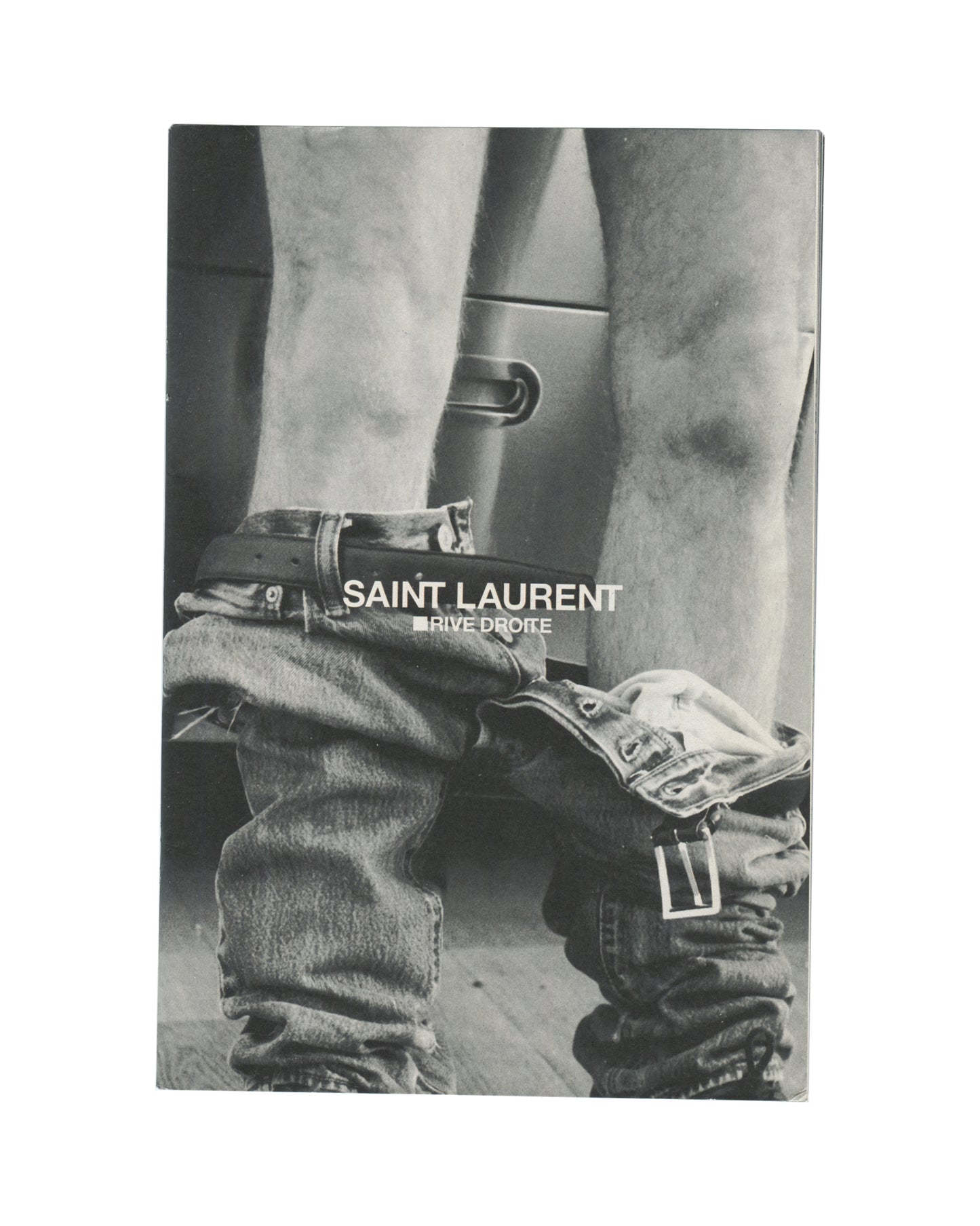 front cover — full-bleed Polaroid-style photograph, abstract blurred botanical forms in pale yellow-green, black and pink; white sans-serif type centred: "01 / INDIGO LEWIN"