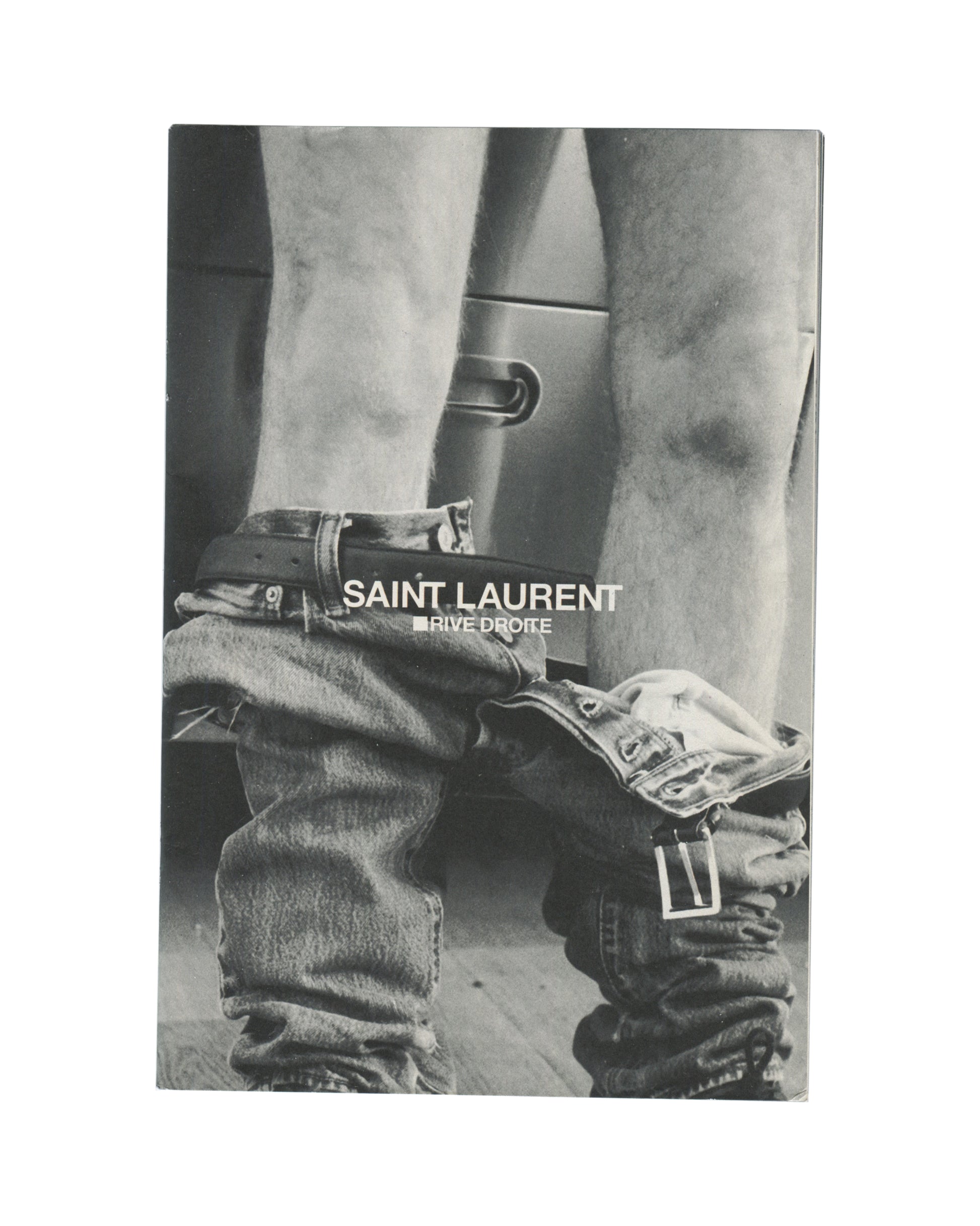 front cover — full-bleed Polaroid-style photograph, abstract blurred botanical forms in pale yellow-green, black and pink; white sans-serif type centred: "01 / INDIGO LEWIN"