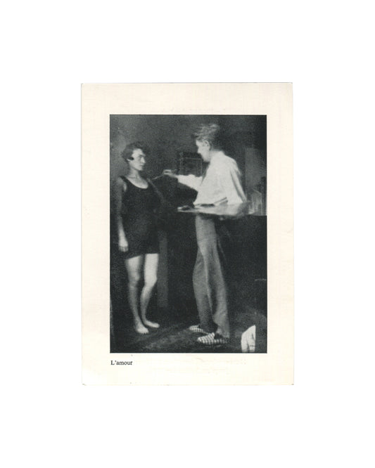 Original 1976 exhibition invitation for René Magritte, La Fidélité des Images, ARC 2, Musée d'Art Moderne de la Ville de Paris, front, showing a black-and-white reproduction of Magritte's photograph L'amour: two figures in an interior, one in a dark swimsuit standing barefoot, the other in a white shirt holding a palette and reaching toward the first, captioned L'amour in small italic type below, on cream card.