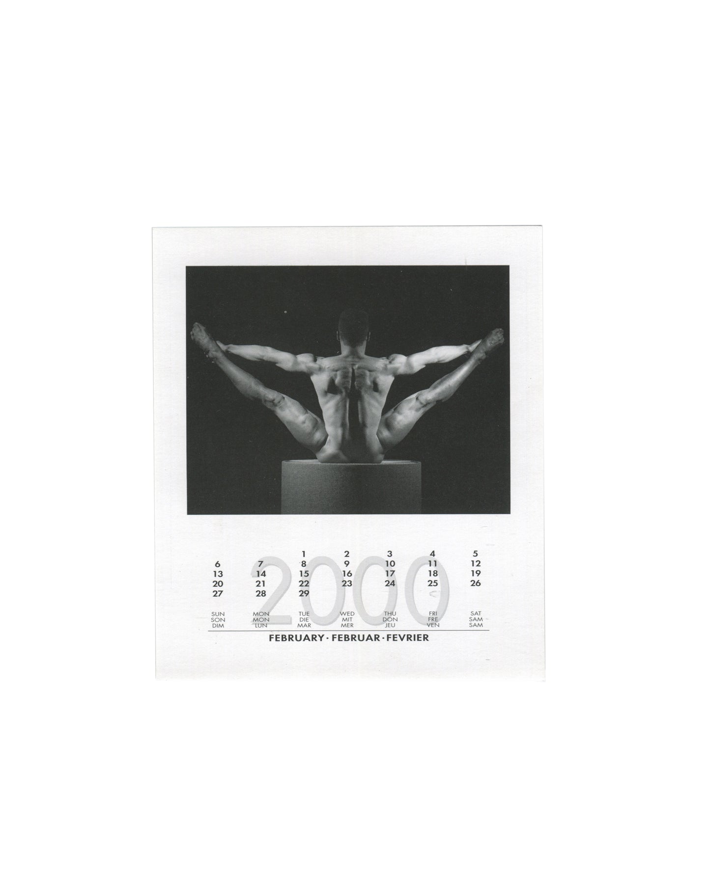  February 2000 card from Robert Mapplethorpe, 2000 Calendar, teNeues, 1999, showing a black-and-white photograph of two nude male figures seated back-to-back on a plinth, their legs extended symmetrically outward and upward to form a wide V-shape against a dark background, with the February 2000 calendar grid printed below in English, German, and French.