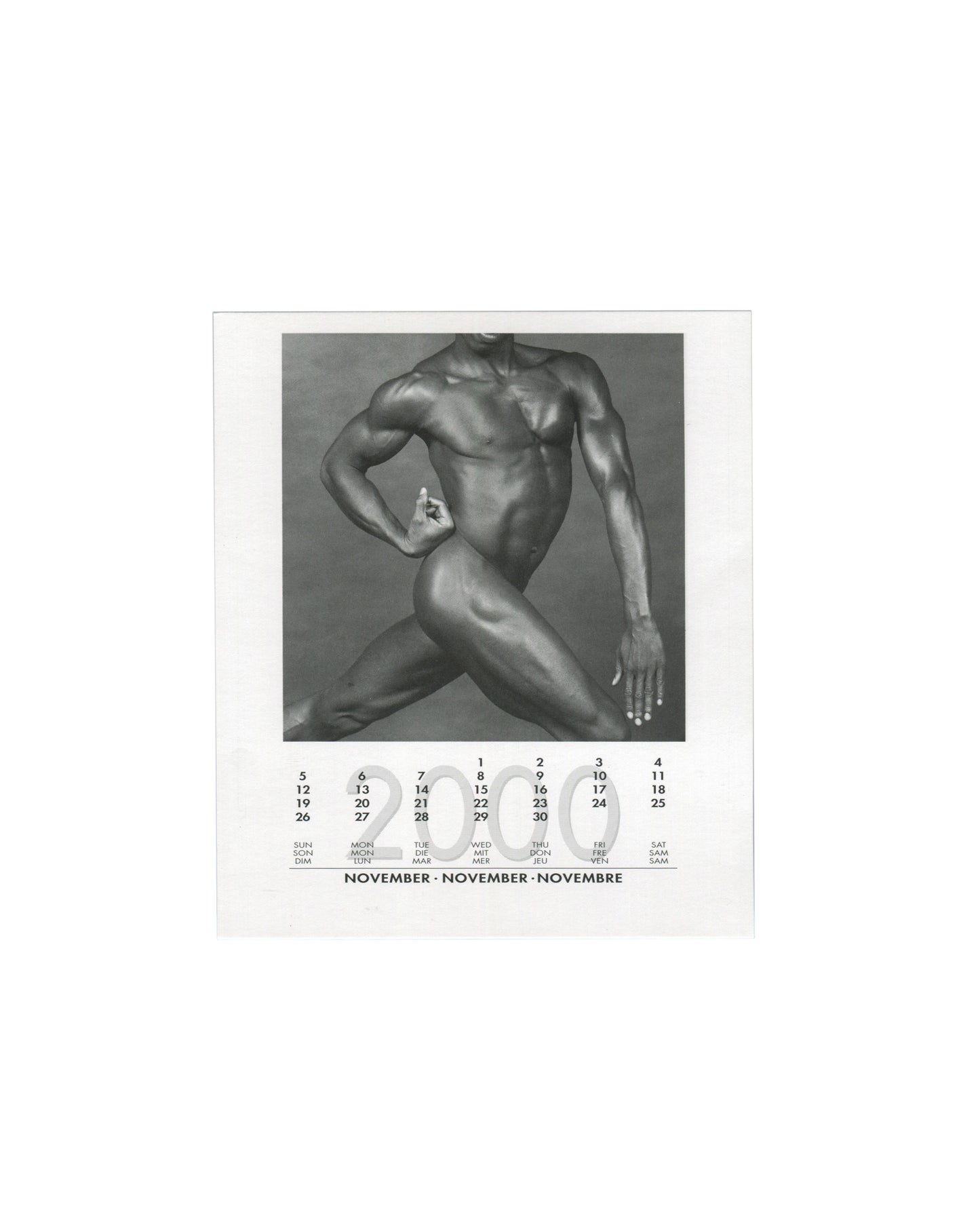 November 2000 card from Robert Mapplethorpe, 2000 Calendar, teNeues, 1999, showing a black-and-white photograph of a nude Black male figure in a dynamic crouching pose, one arm raised and one lowered, the body lit to emphasise sculptural form against a light background, with the November 2000 calendar grid printed below in English, German, and French.