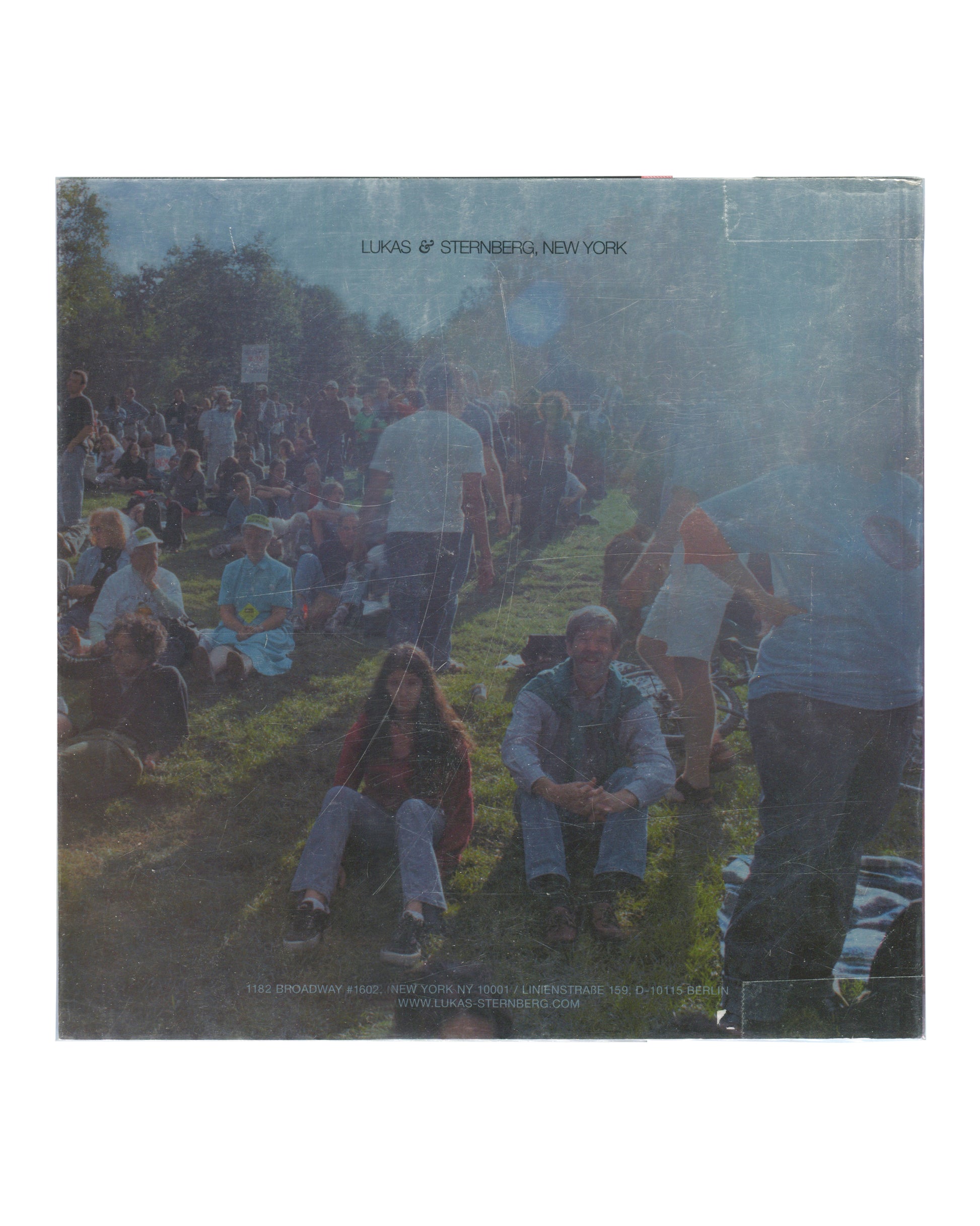 Josephine Meckseper, Catalogue No. 1, Lukas & Sternberg 2004, outdoor crowd scene, smoke, Lukas & Sternberg New York