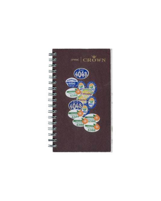 Facsimile artist sketchbook, Rafael Melendez, Peel You: A 2006 Facsimile Sketchbook, The Academy of Realness, 2021. Edition of 2. 8 × 15.5 cm, 102 pages, spiral-bound. Dark brown Crown Spiral notebook cover reproduced with produce stickers applied: PLU# 4048 (×2), Kiwifruit 4030 Chile, Valencia 4388 (×4), Lemon 4012 (×2), and further overlapping fruit PLU labels in blue, green, and orange. Silver spiral binding left edge.