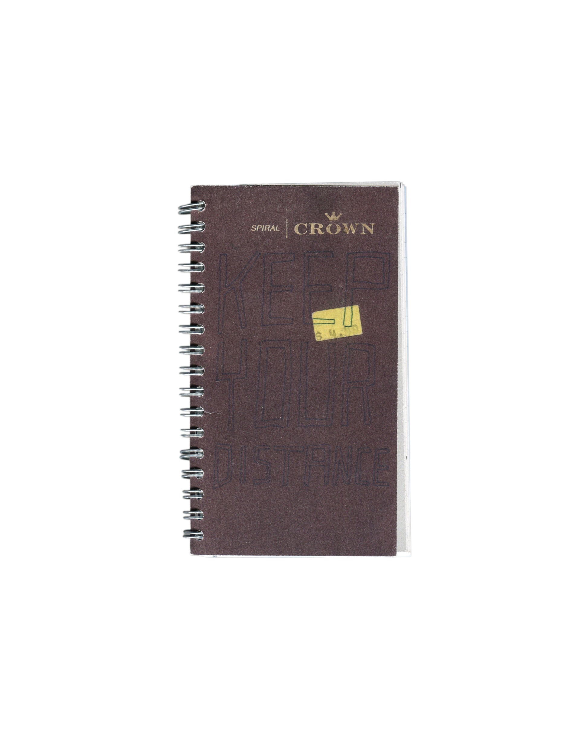 Facsimile artist sketchbook, Rafael Melendez, Keep Your Distance: A 2006 Facsimile Sketchbook, The Academy of Realness, 2021. Edition of 2. 8 × 15.5 cm, 102 pages, spiral-bound. Dark brown Crown Spiral notebook cover; 'SPIRAL | CROWN' logo with crown motif upper centre in gold. Yellow N.Y. Central price sticker centre. Silver spiral binding left edge. Scuffs and handling marks visible as reproduced from source notebook.