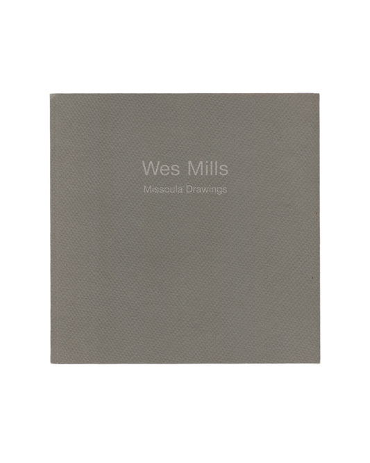 Wes Mills — Missoula Drawings, Joseph Helman Gallery, New York, 2000. Front cover. Uniform grey textured wraps. White sans-serif text centred lower half: "Wes Mills" above "Missoula Drawings". No image. Surface grain visible throughout.