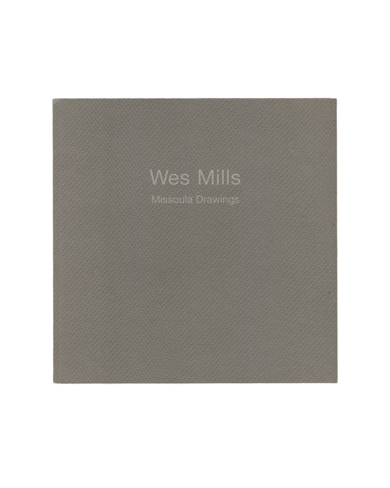 Wes Mills — Missoula Drawings, Joseph Helman Gallery, New York, 2000. Front cover. Uniform grey textured wraps. White sans-serif text centred lower half: "Wes Mills" above "Missoula Drawings". No image. Surface grain visible throughout.