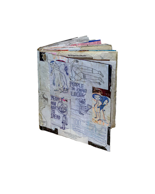 Exterior view showing heavily worked covers and spine; blue tape, polka-dot paper patches, and layered collage elements visible across front and back boards; accumulated material thickness visible at spine edge; object shows significant handling consistent with production and use