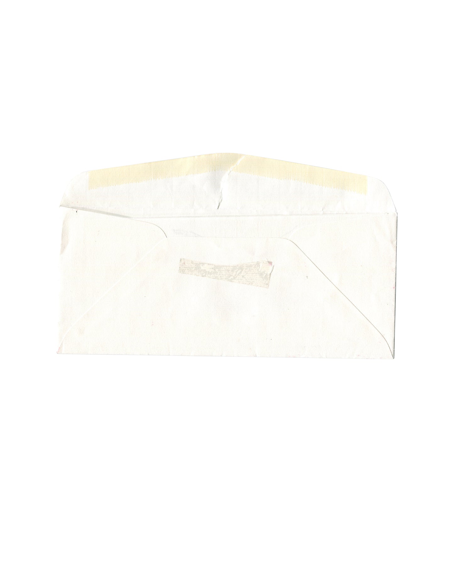 Reverse of Yoko Ono Studio One envelope opened to show interior flap, adhesive residue, creases, and signs of use