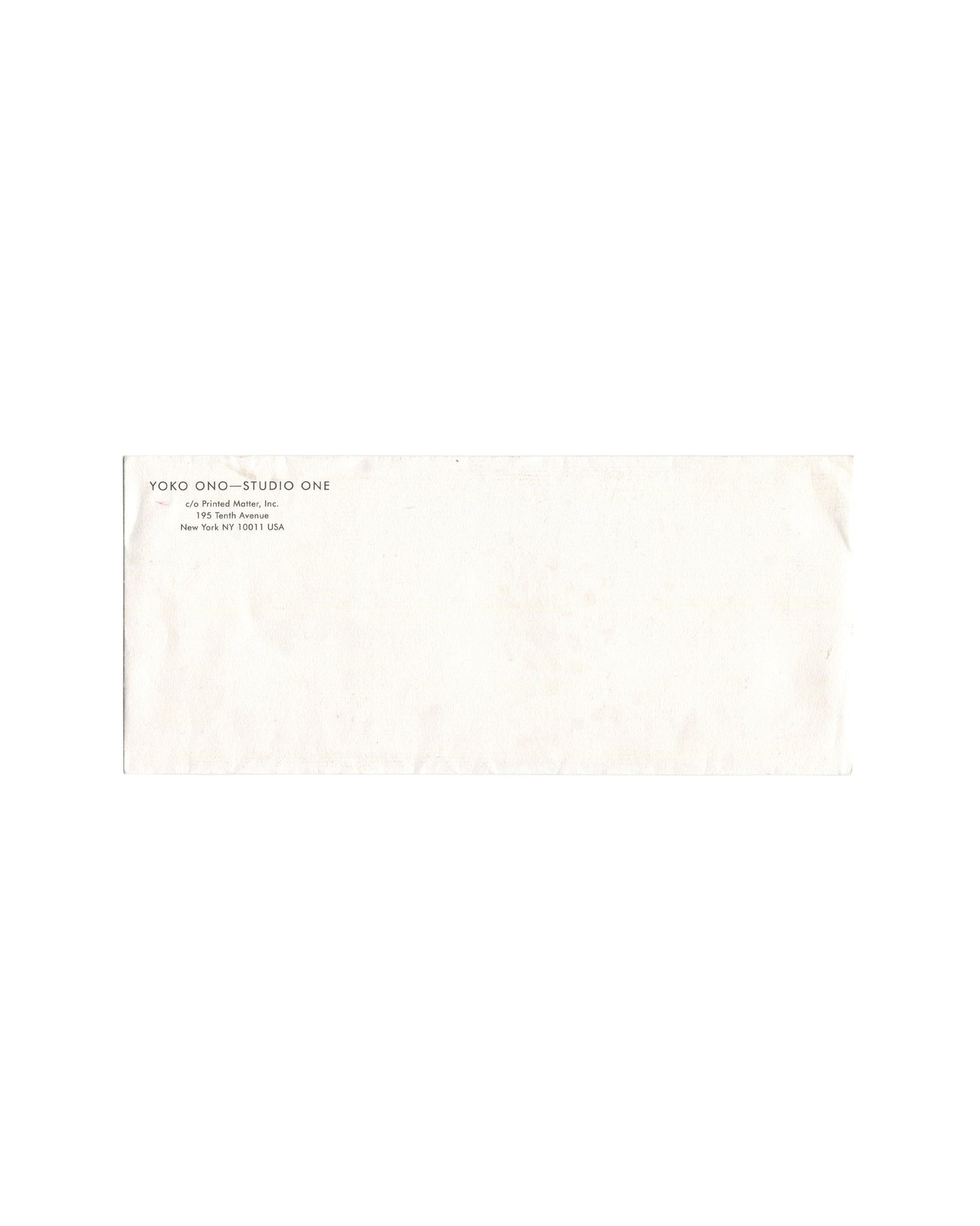 Front of original Yoko Ono Studio One envelope distributed with the *Dollar Piece* Printed Matter membership multiple, showing return address information and light handling wear.