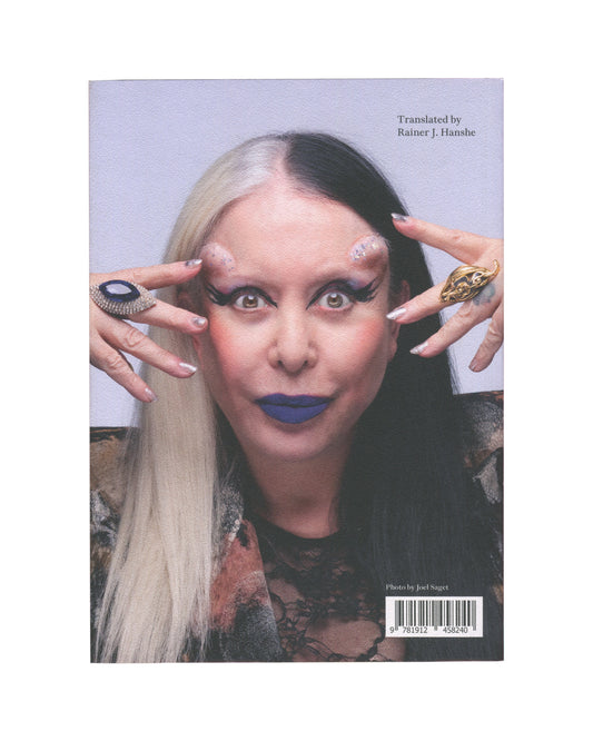 ORLAN, Strip-Tease: All About My Life All About My Art, The Everyday Press, 2024, back cover portrait by Joel Saget, blue lipstick, forehead implants visible