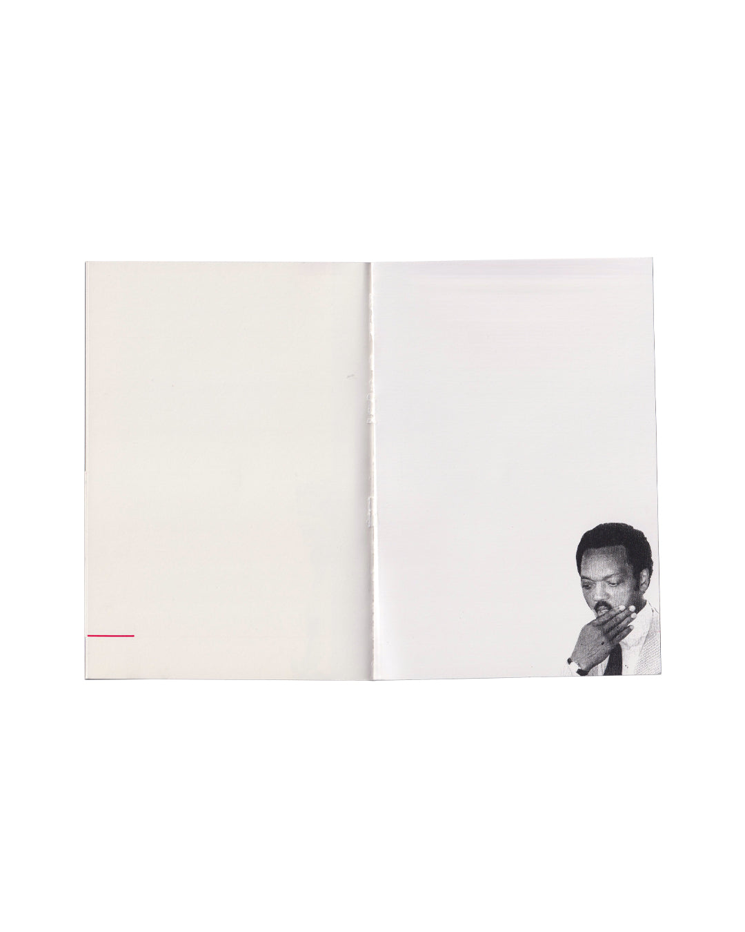 Peter Downsbrough, Take Note, Villa Arson, Nice, 1988. Interior spread: white pages with black-and-white photograph of a man (Jesse Jackson) in contemplative pose, cropped at lower right corner, red horizontal rule at lower left