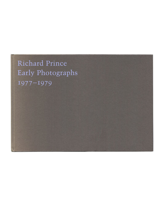 Richard Prince, Early Photographs 1977–1979, front cover. Skarstedt Fine Art, New York, 2001. Grey hardcover boards with title 'Richard Prince / Early Photographs / 1977–1979' in pale blue-grey serif type, upper left. No image. Restrained, object-like design.
