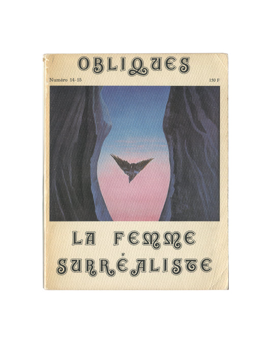 Obliques No. 14–15, La Femme Surréaliste — front cover. Éditions Borderie, Paris, 1977. Decorative gothic lettering on cream textured card. Centre image: Jane Graverol's L'Esprit saint, a bird in flight suspended within a rock formation reading as a torso. Surrealist exhibition ephemera.