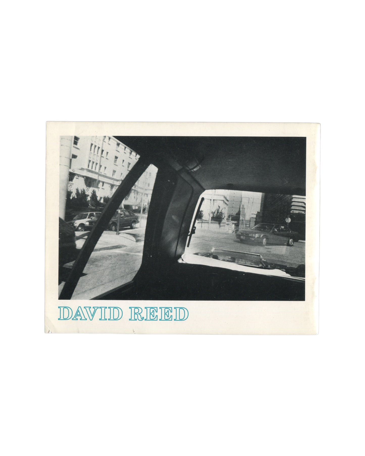 David Reed, Two Bedrooms in San Francisco, back cover: b&w rear-window view, parked cars, teal DAVID REED type
