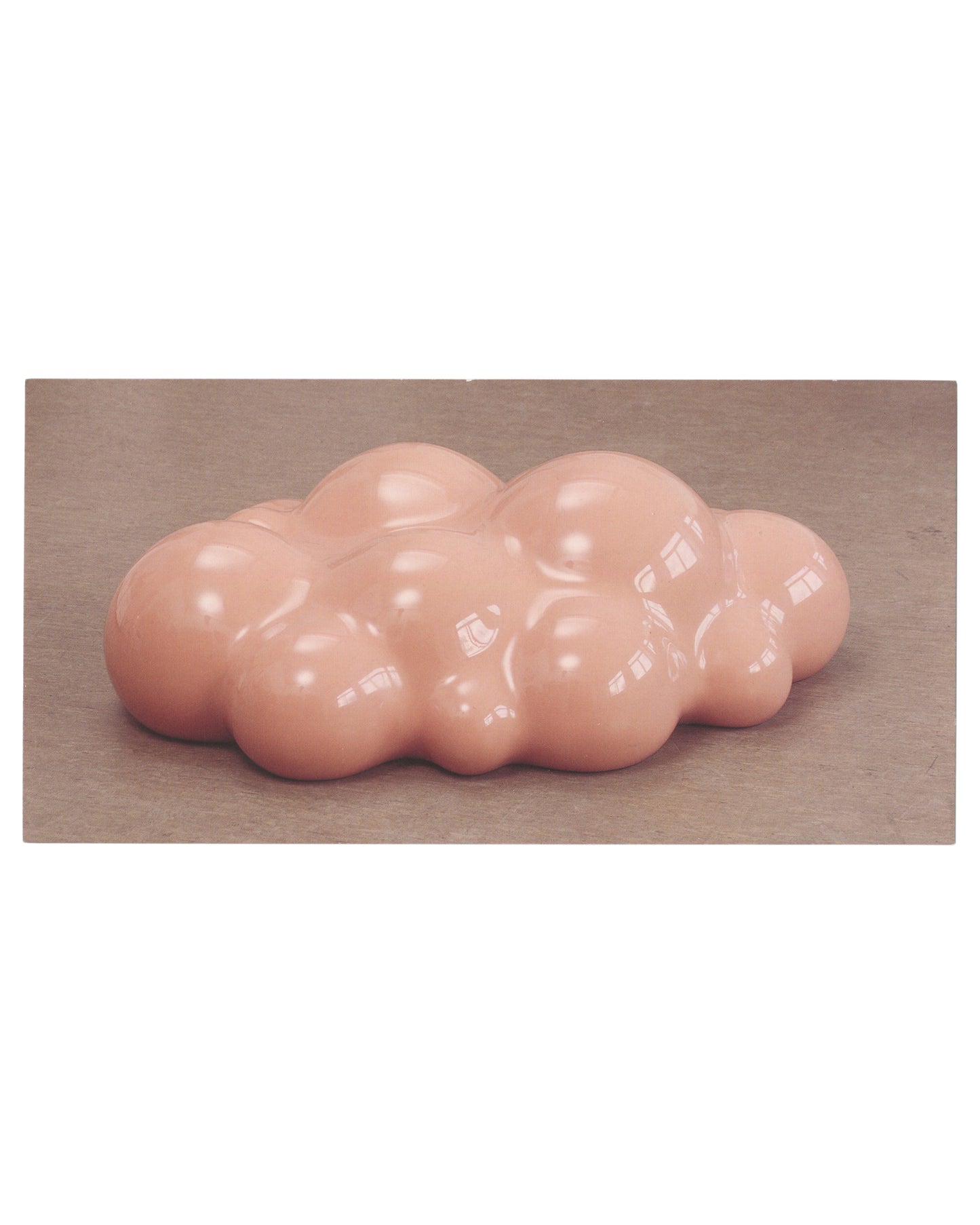 Front of original 1997 Thomas Rentmeister exhibition invitation card for Centre d’art contemporain de Vassivière in France, featuring a glossy pale pink biomorphic polyester sculpture against a neutral background.