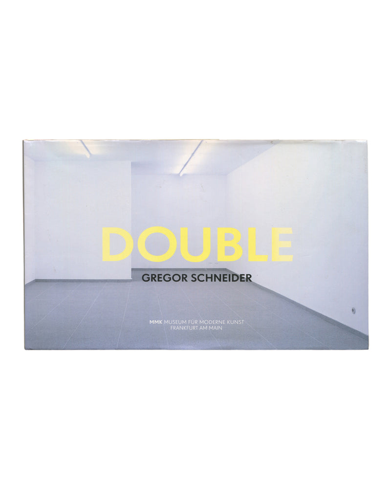 Gregor Schneider, Double, MMK Frankfurt 2011, front dust jacket, empty white gallery interior, large yellow DOUBLE title