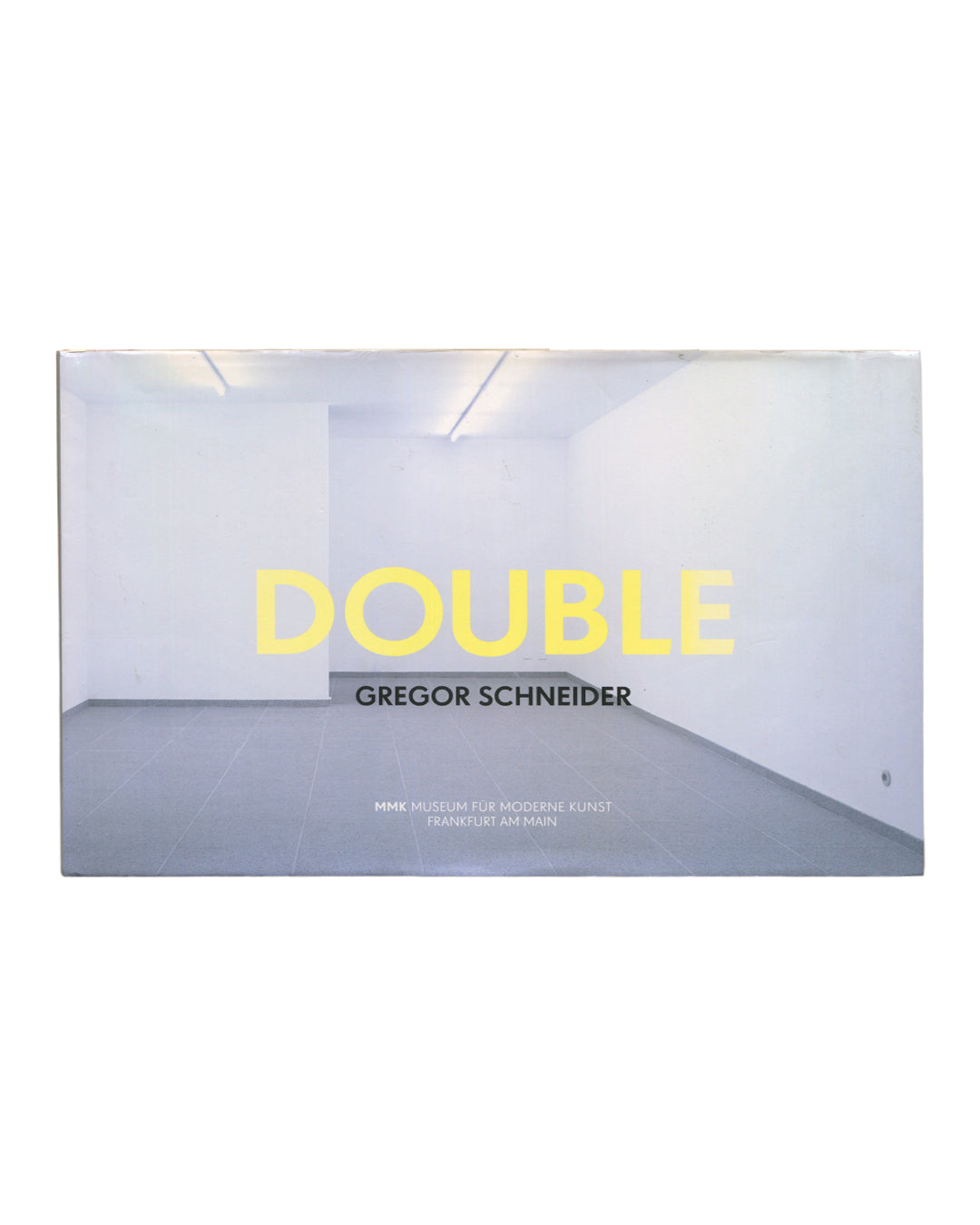 Gregor Schneider, Double, MMK Frankfurt 2011, front dust jacket, empty white gallery interior, large yellow DOUBLE title 