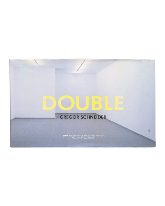 Gregor Schneider, Double, MMK Frankfurt 2011, front dust jacket, empty white gallery interior, large yellow DOUBLE title 
