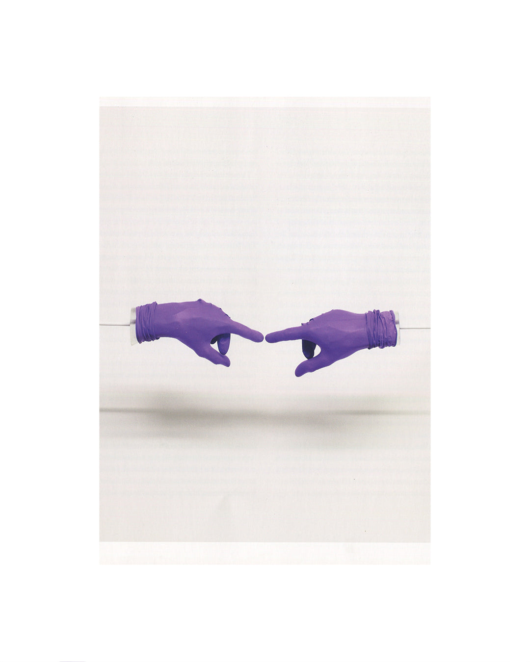 Gregor Schneider, Double, 2011, interior, two purple latex-gloved hands pointing through narrow wall gap, white ground 