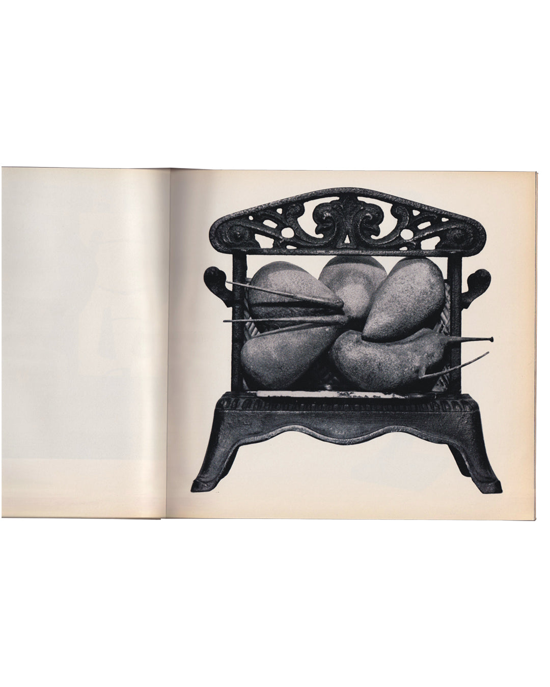 `Interior spread, Seul, et le corps…, Galerie du Dragon, Paris, 1966. Black-and-white photograph of a sculpture by Philippe Hiquily: bulbous, biomorphic forms contained within an ornate cast-iron grate or fire basket, pierced by thin metal rods. Printed on cream paper, catalogue open flat.`
