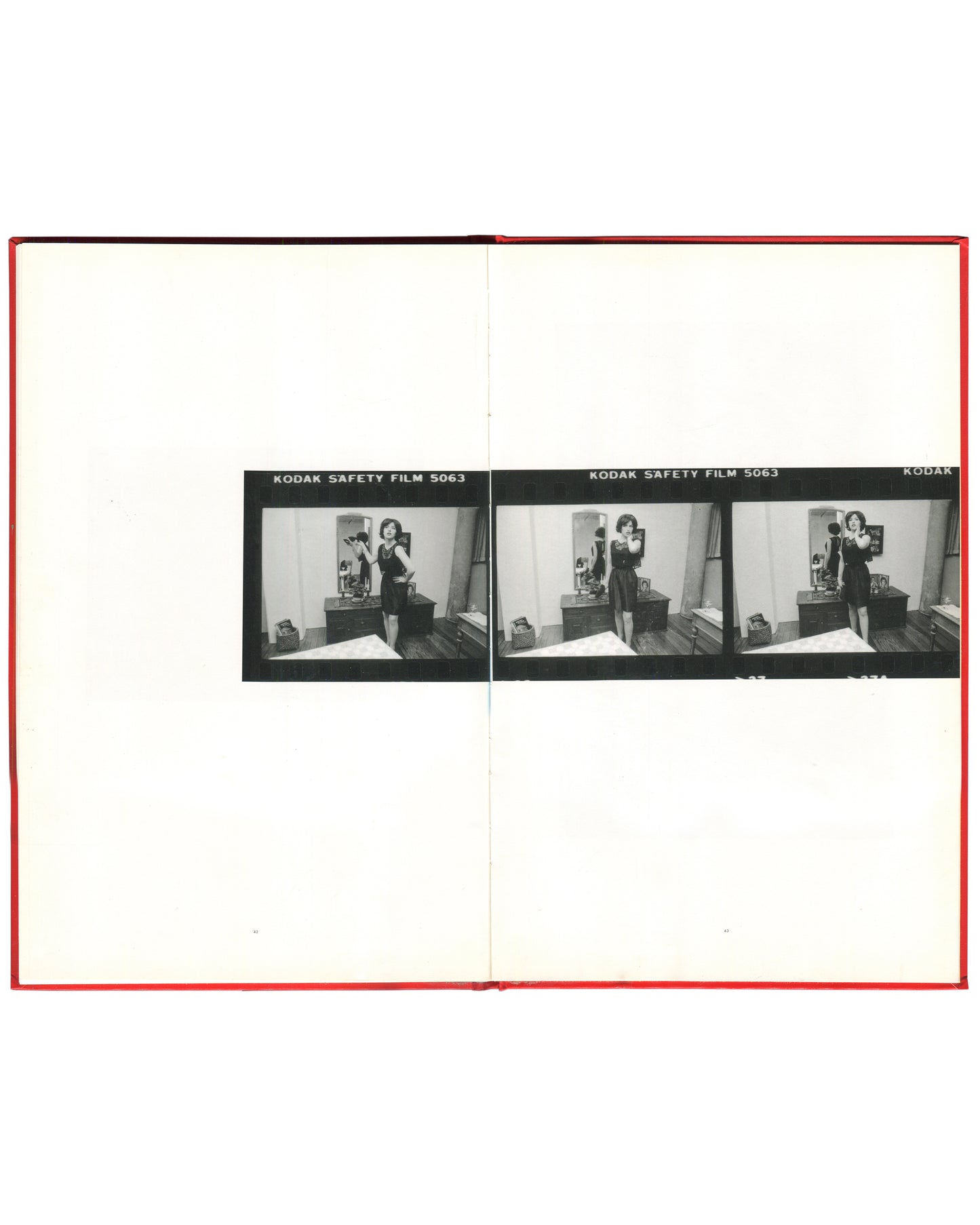 Cindy Sherman, Hasselblad Award 1999, interior spread: Kodak Safety Film 5063 contact strip — three frames of Sherman in black dress, camera raised, bedroom mirror, 1977