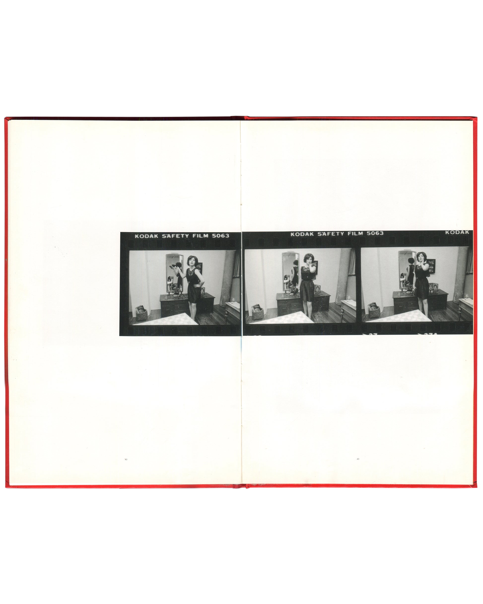 Cindy Sherman, Hasselblad Award 1999, interior spread: Kodak Safety Film 5063 contact strip — three frames of Sherman in black dress, camera raised, bedroom mirror, 1977